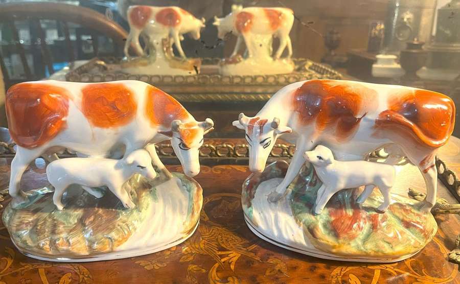 Pair 19thC Staffordshire Cow Figures