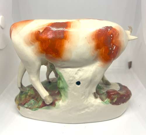 Pair 19thC Staffordshire Cow Figures